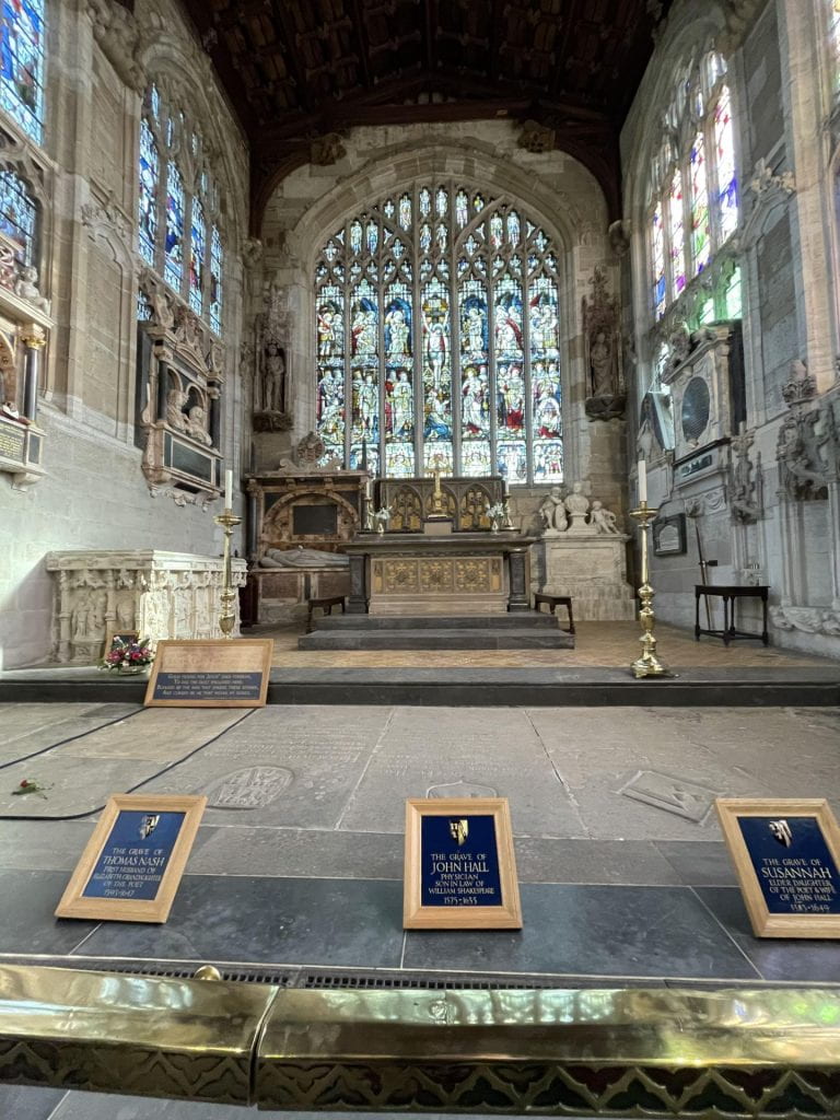 A picture of Shakespeare's grave inside a beautiful church. 
