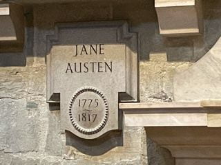 A plaque bearing the name "Jane Austen" 