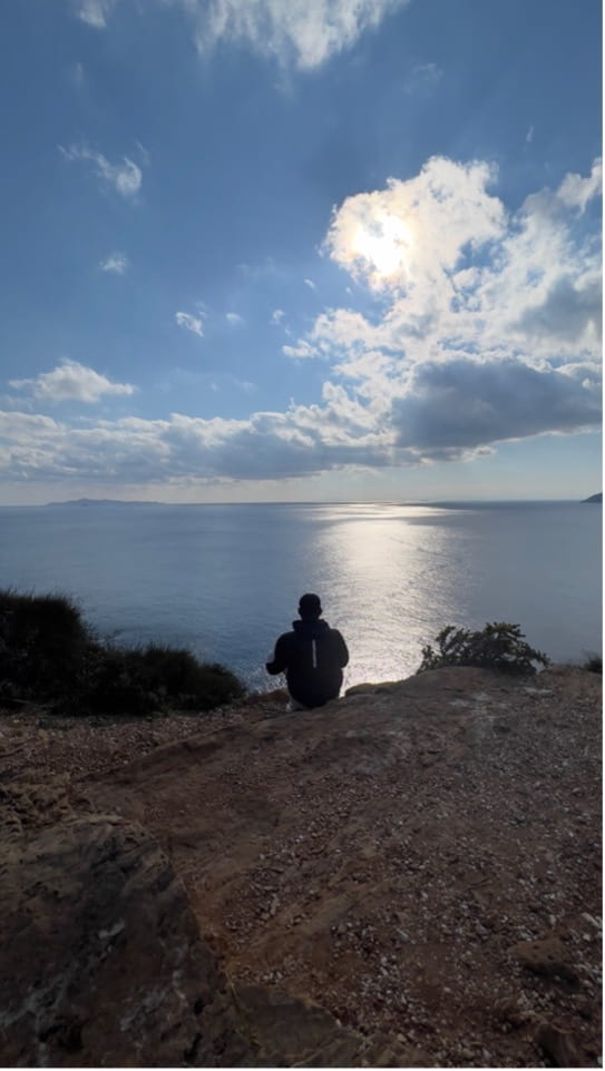 Justin overlooking the ocean