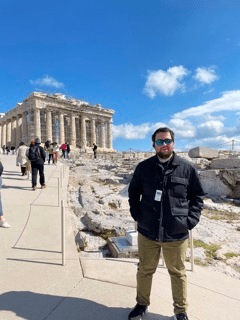 Colin standing in front of the Parthenon