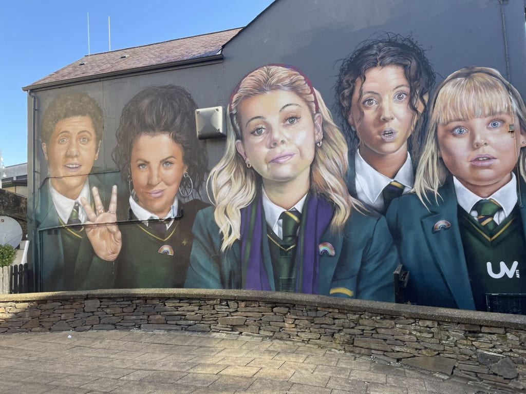 A mural in Derry featuring the Derry Girls