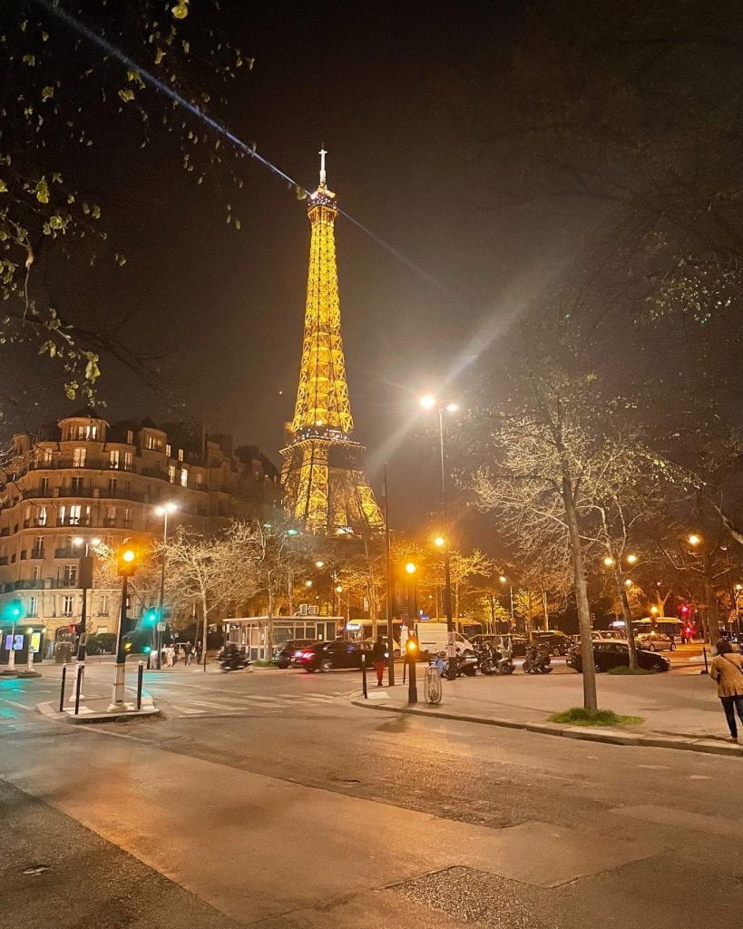 The Eiffel Tower lit up at night.