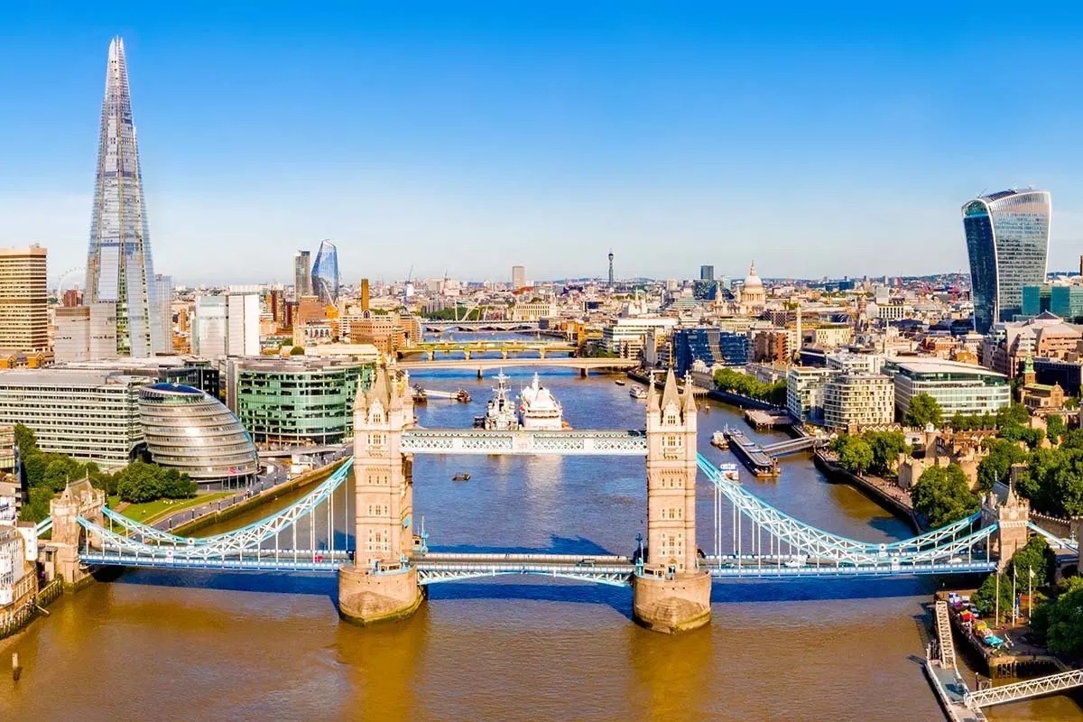 An aerial view of London, looking up the River Thames from Tower Bridge